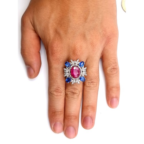 762 - Star Lot : A fabulous Natural Ruby, Diamonds and Sapphire ring. With 1.8cts Ruby, 1.4cts of combined... 