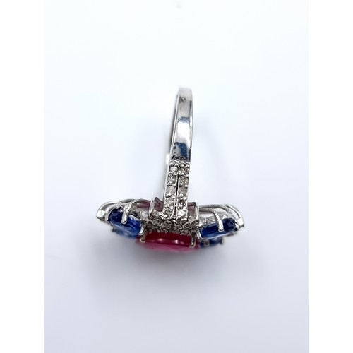 762 - Star Lot : A fabulous Natural Ruby, Diamonds and Sapphire ring. With 1.8cts Ruby, 1.4cts of combined... 