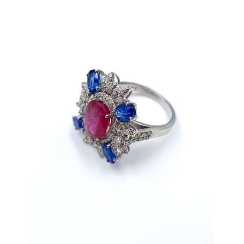 762 - Star Lot : A fabulous Natural Ruby, Diamonds and Sapphire ring. With 1.8cts Ruby, 1.4cts of combined... 