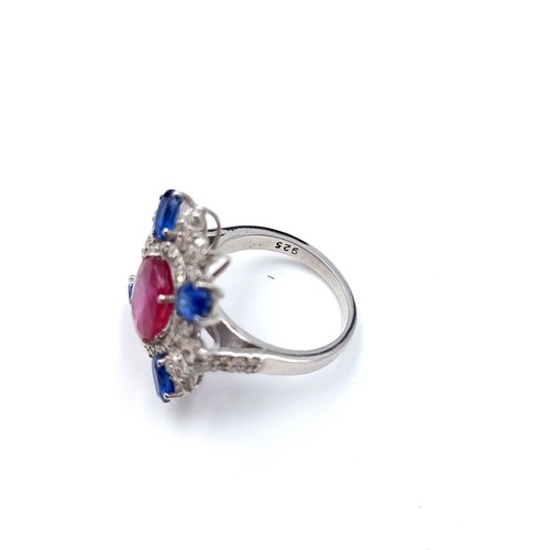 762 - Star Lot : A fabulous Natural Ruby, Diamonds and Sapphire ring. With 1.8cts Ruby, 1.4cts of combined... 