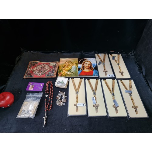 140 - A selection of 10 items of Roman Catholic interest, including seven boxed wooden rosary beads labell... 