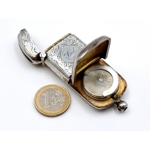 43 - A fine example of a Victorian silver Vesta/Sovereign case. Hallmarked Chester, with fine foliate and... 