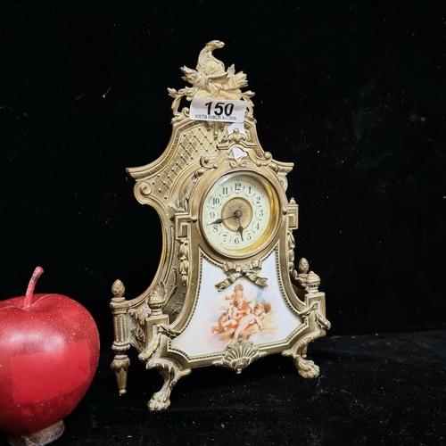 150 - A stunning example of a vintage, Louis XVI style mantle clock with a ornate brass frame and porcelai... 