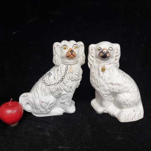 152 - Two early 19th century Staffordshire flat back, Pekinese, porcelain figures. In very good condition ... 