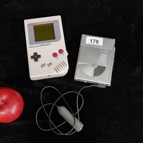 170 - A Nintendo Game Boy, released in 1989. Complete with a Pokémon Blue game. With a Sony MiniDisc Walkm... 