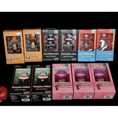 254 - A great collection of eleven collectable figurines of Julius the Monkey designed by artist Paul Fran... 
