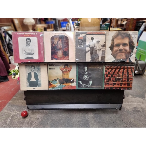 258 - A collection of eight Loudon Wainwrigh III albums, with six signed by Wainwright himself, including ... 