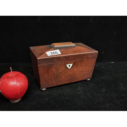 260 - A beautifully proportioned Georgian Circa 1816 sarcophagus shaped tea caddy. The two interior  compa... 
