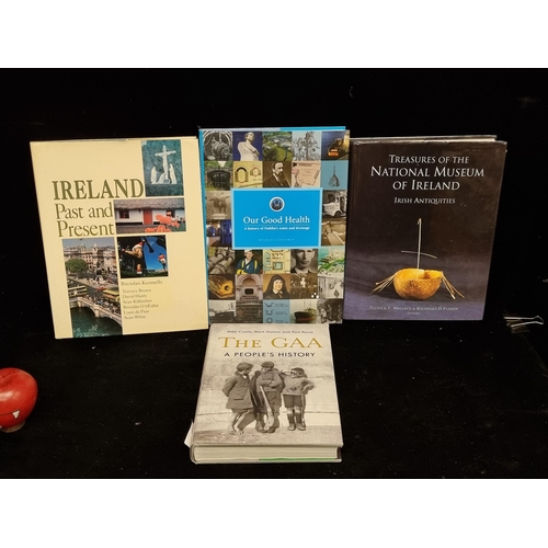 262 - Four hardback books of Irish interest including 'The GAA: A People's History' and 'Ireland: Past and... 