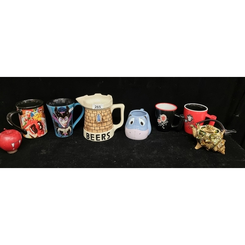265 - 7 mugs and jugs including a large Drostdy ware Grahamstown pottery jug, made in South Africa reading... 