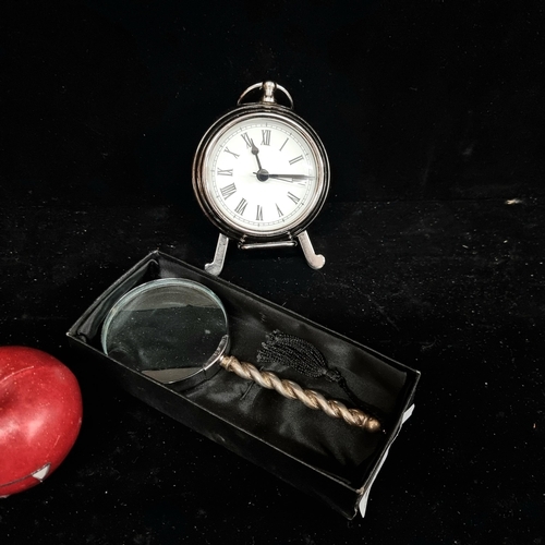 266 - Two items including a rare sterling silver barley twist handled magnifying glass marked C.C. Sheffie... 