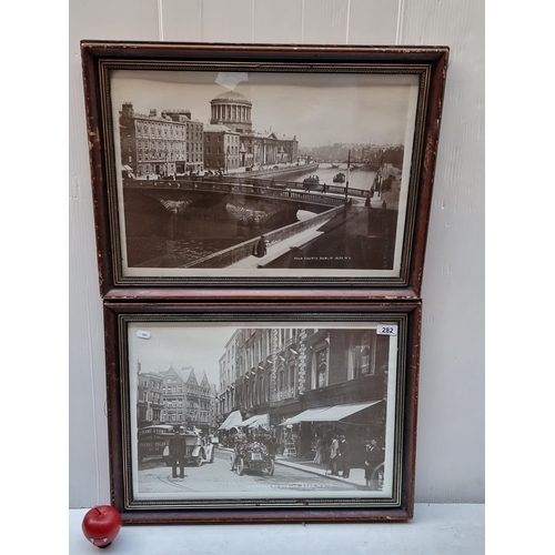282 - Two large framed prints of 19th century Dublin including Grafton Street and the Four Courts.
