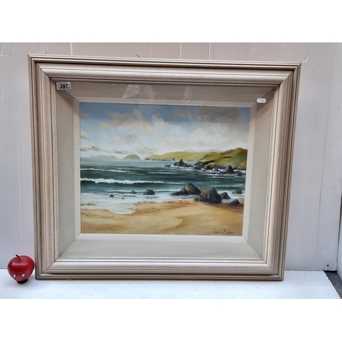 287 - A large original oil on canvas painting by James Butler featuring an Irish coastal scene with a brok... 
