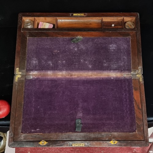 130 - A very attractive Victorian rosewood, brass bound writing slope. The box opens to reveal an attracti... 