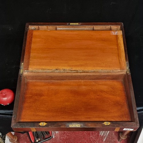 130 - A very attractive Victorian rosewood, brass bound writing slope. The box opens to reveal an attracti... 