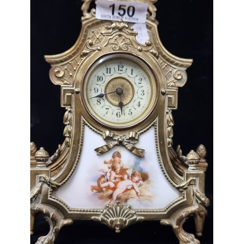 150 - A stunning example of a vintage, Louis XVI style mantle clock with a ornate brass frame and porcelai... 