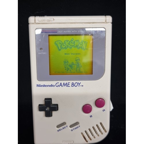 170 - A Nintendo Game Boy, released in 1989. Complete with a Pokémon Blue game. With a Sony MiniDisc Walkm... 