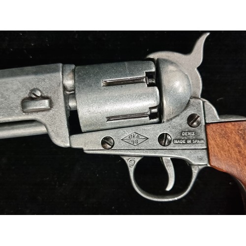 200 - A collectable model 1860 Army Colt revolver by Denix. With nickel sailver barrel and wooden grip. RR... 