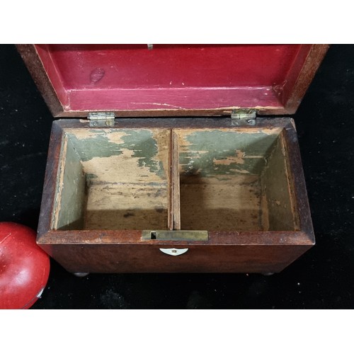 260 - A beautifully proportioned Georgian Circa 1816 sarcophagus shaped tea caddy. The two interior  compa... 