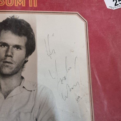258 - A collection of eight Loudon Wainwrigh III albums, with six signed by Wainwright himself, including ... 