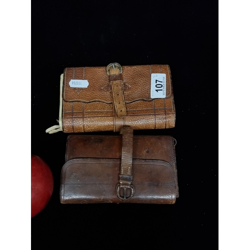 107 - A very interesting pair of genuine leather bound fly fishing wallets, including a H. Whitty Late Edm... 