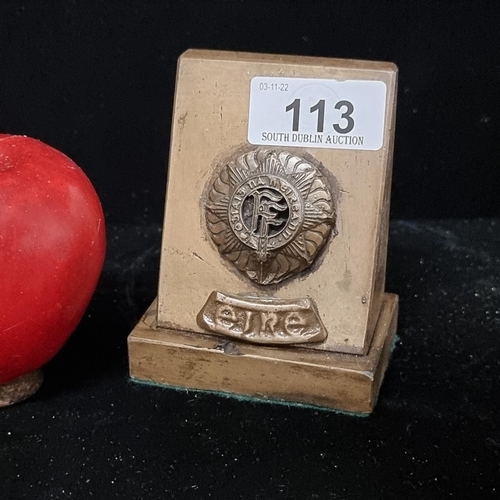 113 - A vintage plaque on a plinth base baring the Irish Army FF insignia.