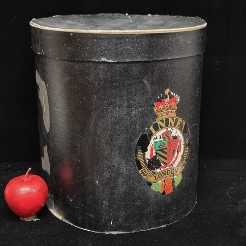 129 - A great antique English made Linney London hat box, specifically for top hats, with colourful logo.