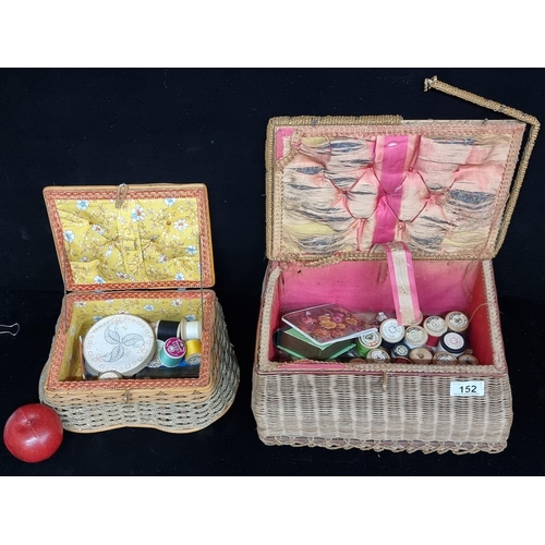 152 - Two vintage, wicker sewing baskets. Both filled with an array of excellent sewing materials such as ... 