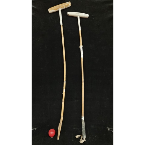 161 - Two vintage polo mallets. With bamboo handle and one example features a wrapped handle. L52''