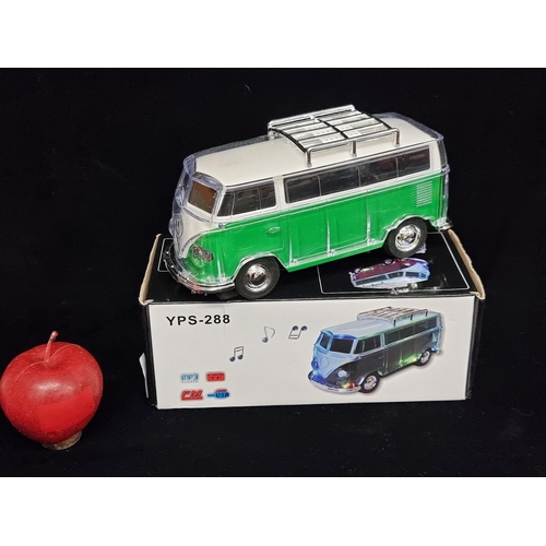 215 - A brilliant radio in the form of a Volkswagen Campervan, features FM radio, LED light display and us... 