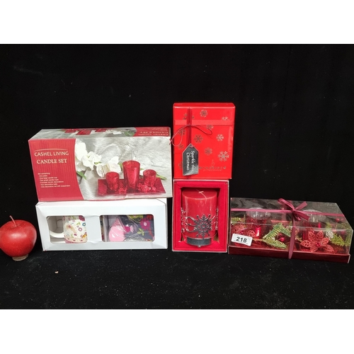 218 - Four items including a Shannonbridge Ireland mug and sock gift set, a Cashel Living candle set and a... 