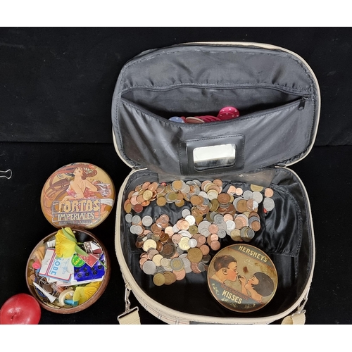 223 - A vanity travel bag containing a large amount of poker chips, pre decimal and euro cent coins and tw... 