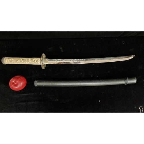 235 - A Japanese techi katana sword. With a carved hilt in ivorine, featuring warriors in combat. With a p... 