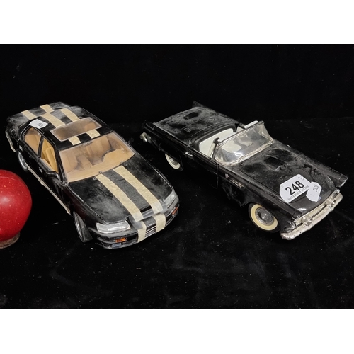 248 - Two die cast model cars including a Ford Thunderbird (1/18) and a Lexis LS400 (1/18) both with openi... 