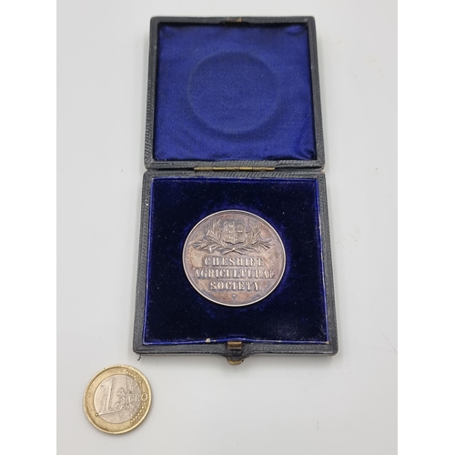 511 - A sterling silver antique presentation medal by the 