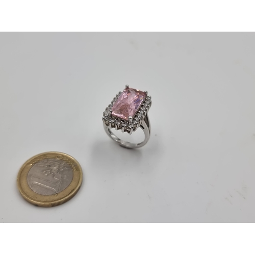 521 - A super pretty vintage pink tourmaline Facet cut gem set ring, with a fabulous Zircon stone surround... 