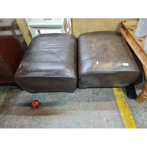 553 - A pair of very handsome, mahogany leather footstools. Very nice examples in good condition.