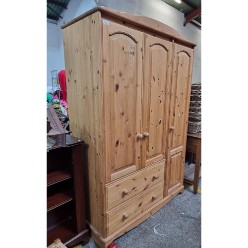 578 - A good wardrobe with a main body with mirror, a side storage with door and two drawers to base. H185... 