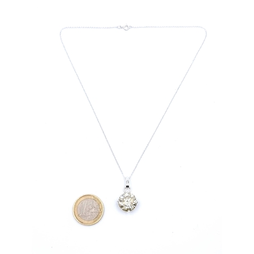 59 - A brilliant White Mossianite 9.3 carat necklace, set with a sterling silver chain. Huge sparkle to t... 