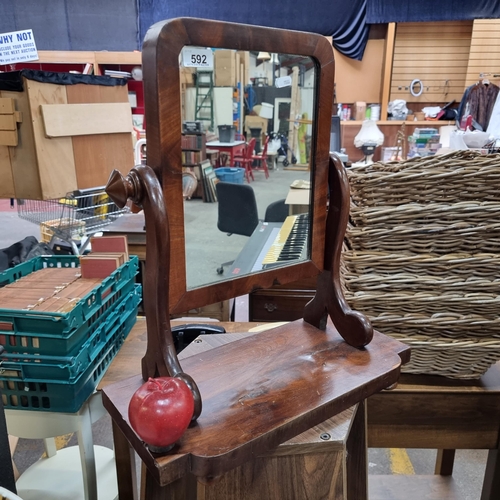 592 - A lovely victorian neat size tabletop swing mirror. The mirror is set into a rectangular frame, with... 