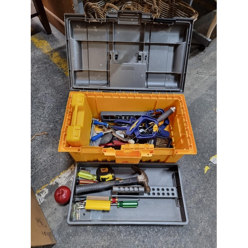 594 - A deep large Plano tool box, with removable partitioned tray. Filled with a large collection of tool... 