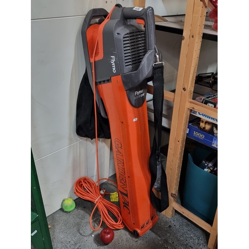 636 - A FLymo Garden Vac leaf blower with carry strap.