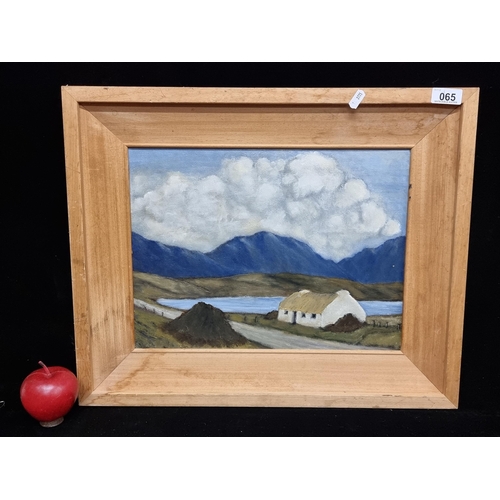 65 - A lovely oil on canvas After Paul Henry (1877-1958)  painting featuring a charming west of Ireland l... 