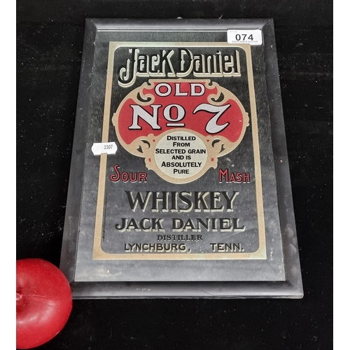 74 - A neatly sized framed advertising mirror for Jack Daniels Whiskey.