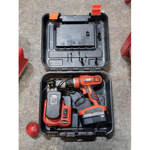 653 - A hard wearing Black & Decker 18v 1.7Ah electric screwdriver Model no A1718. In hard carry case and ... 