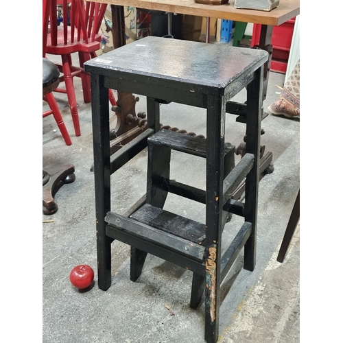 659 - A lacquered wood stool with accompanying step ladder/footrest.