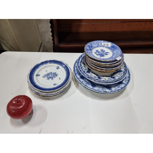 682 - A collection of nineteen antique and vintage blue and white china plates, with examples from Spode a... 