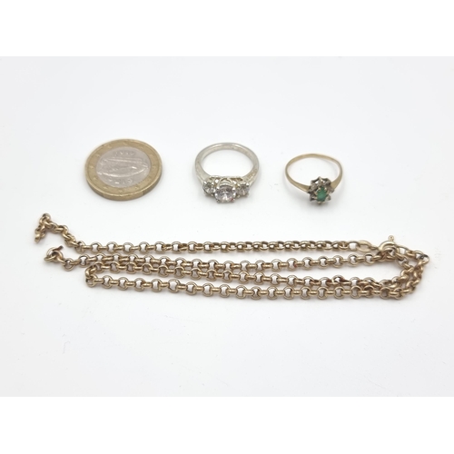 828 - A good collection of three items, consisting of a 9 carat Gold chain (in need of a smalll repair) of... 