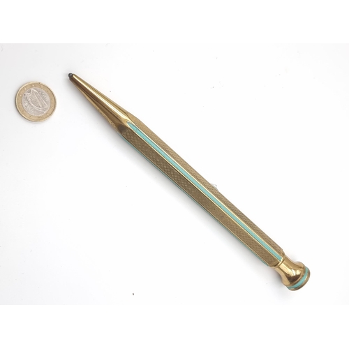 830 - A huge fullly functional Propelling pencil with gold tone and teal enamel. Inc additional pencil lea... 