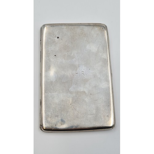 9 - An extremely nice example of a very heavy gauge sterling silver antique cigarette case, featuring an... 